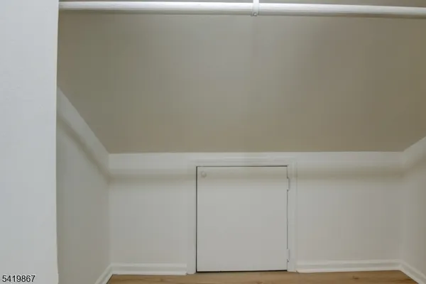 a view of hallway with windows