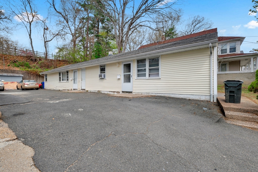 746-748 Alden Street Springfield, MA 01109 - Photo 1 of 22 a view of a house with a garage