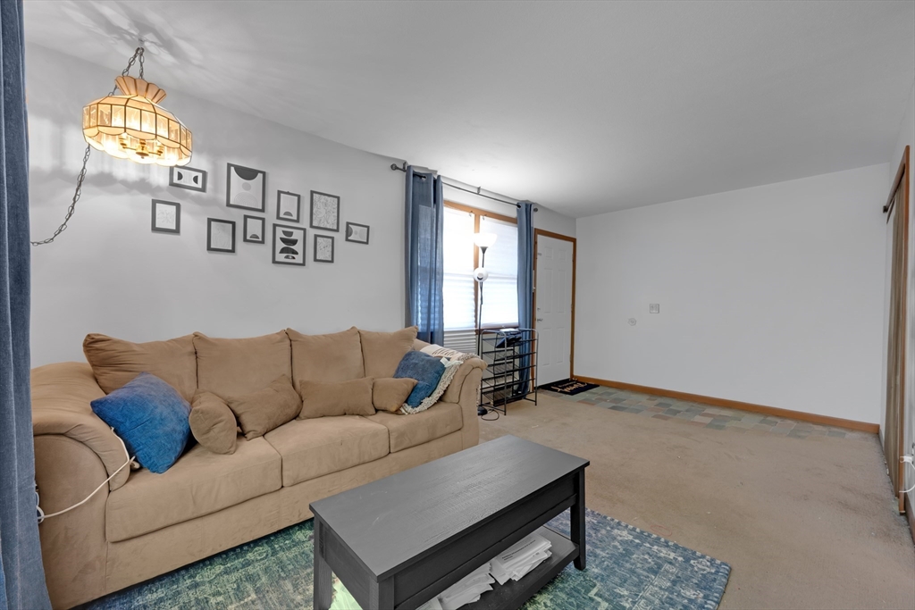746-748 Alden Street Springfield, MA 01109 - Photo 4 of 22 a living room with furniture and window