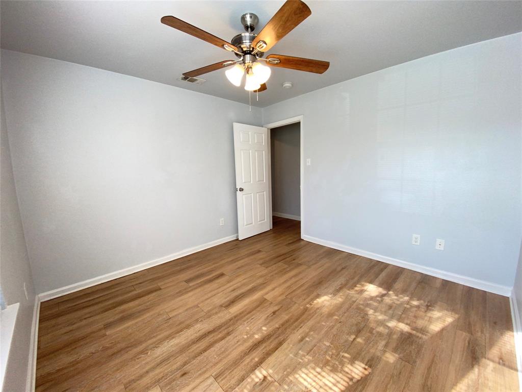 6928 Alexandria Court Fort Worth, TX 76133 - Photo 14 of 28 a view of a room with a ceiling fan