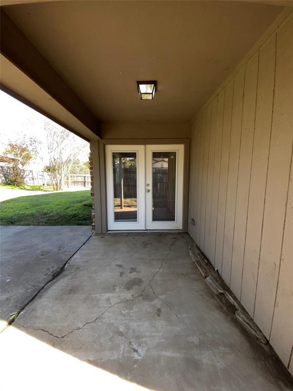 6928 Alexandria Court Fort Worth, TX 76133 - Photo 28 of 28 a view of a house with a garden