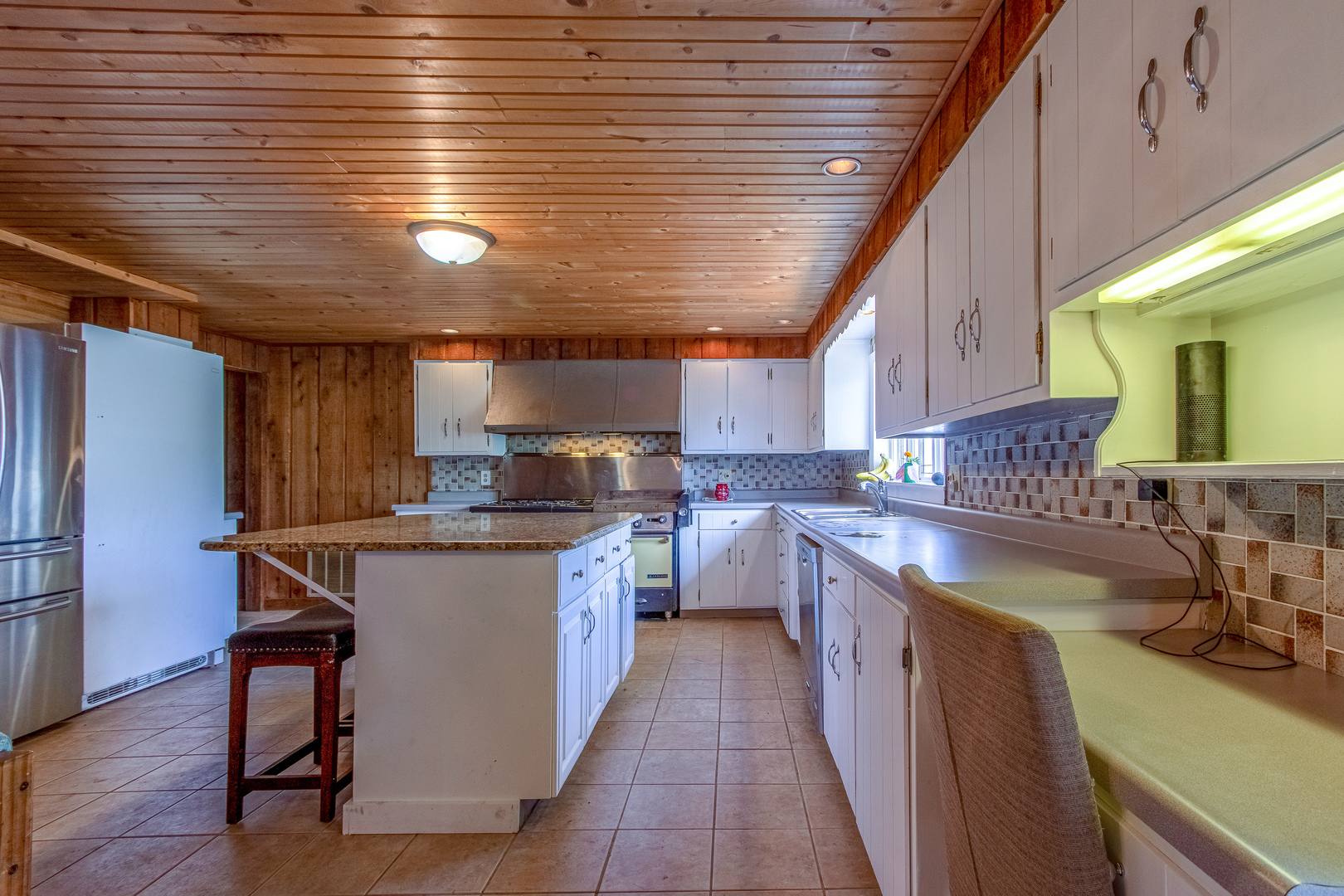 4318 North River Road Byron, IL 61010 - Photo 20 of 28 a kitchen with a sink appliances cabinets and furniture