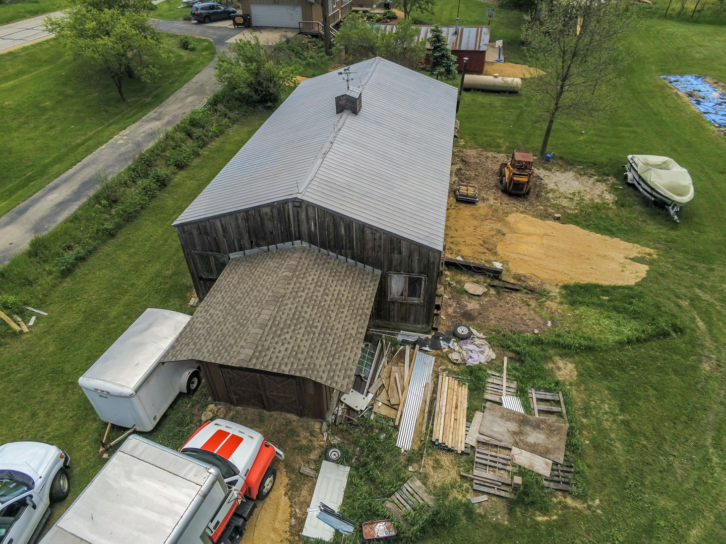 4318 North River Road Byron, IL 61010 - Photo 7 of 28 an aerial view of a house with a yard