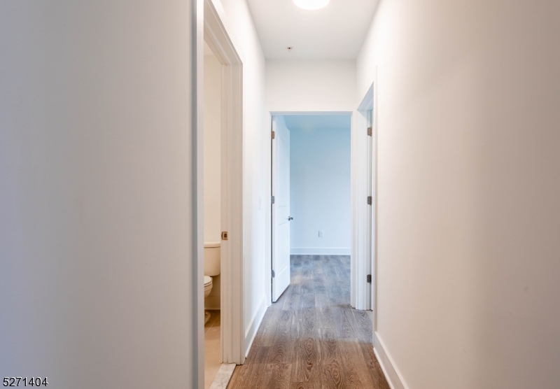 1025 Raritan Road, Unit 303 Clark, NJ 07066 - Photo 17 of 21 a view of a room with wooden floor