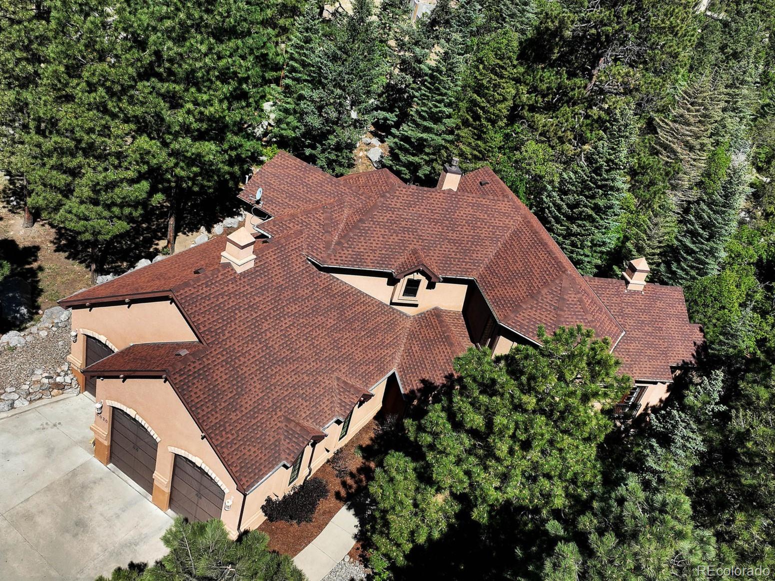 an aerial view of house with yard
