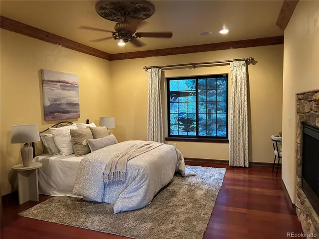 a view of a room with wooden walls and stairs