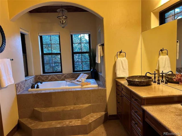 a kitchen with stainless steel appliances granite countertop wooden cabinets a sink and dishwasher