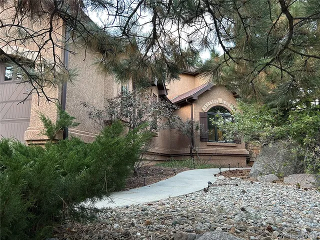 a view of balcony with wooden floor and fence