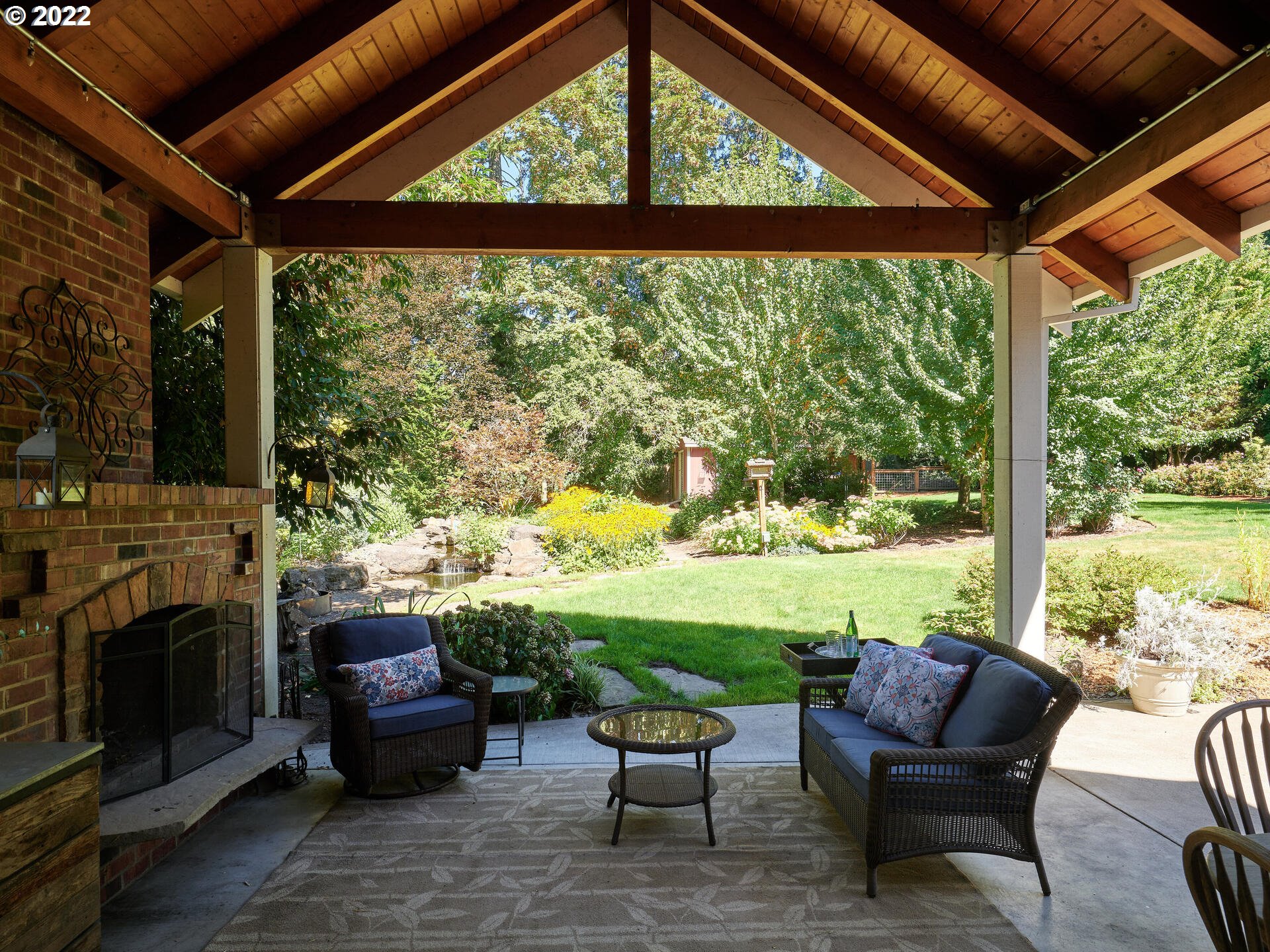 4825 Southwest Evans Street Portland, OR 97219 - Photo 25 of 32 a outdoor living space with furniture and garden view