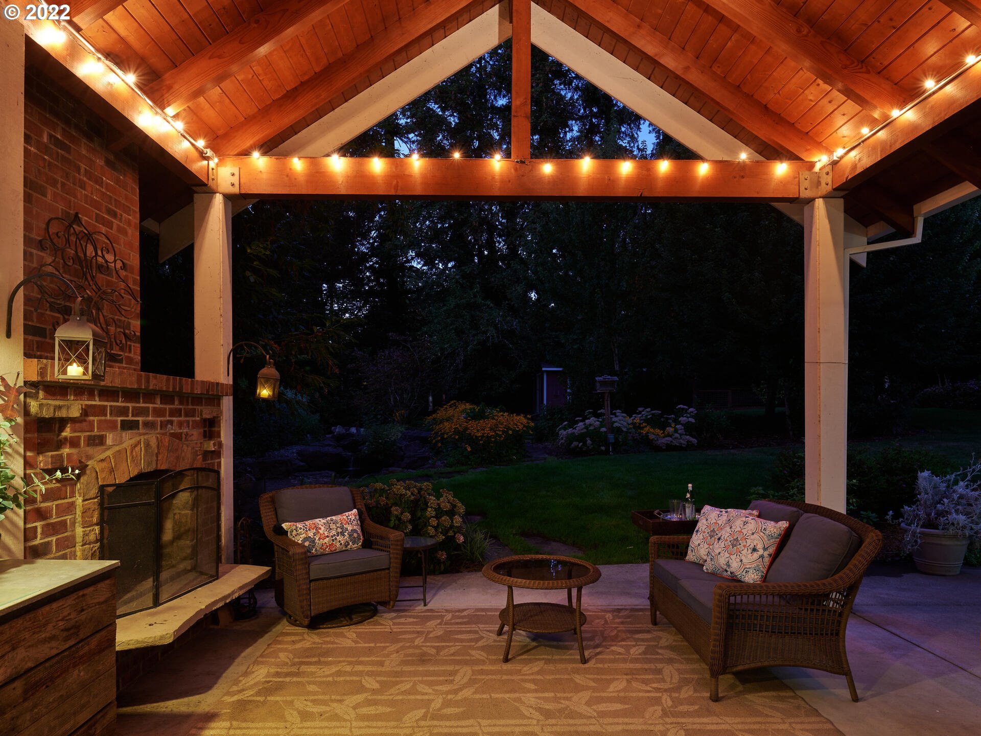 4825 Southwest Evans Street Portland, OR 97219 - Photo 26 of 32 a outdoor space with patio the couches and a potted plant