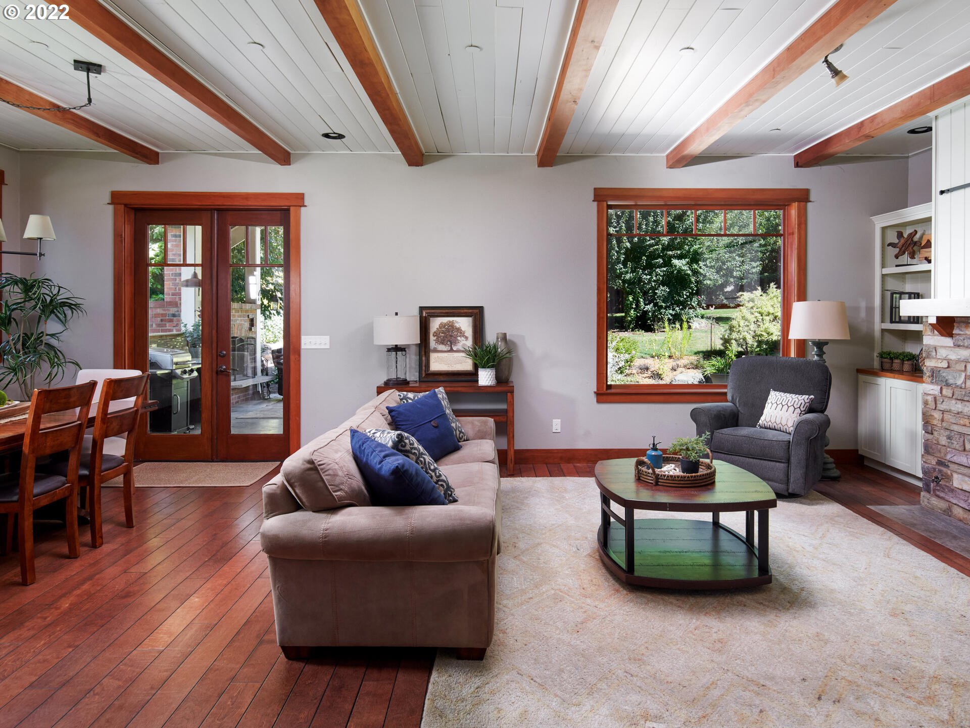 4825 Southwest Evans Street Portland, OR 97219 - Photo 6 of 32 a living room with furniture and a large window