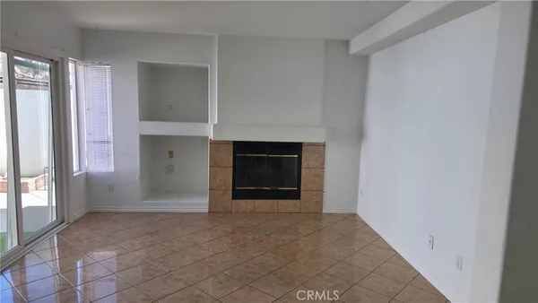 a kitchen with stainless steel appliances granite countertop a sink stove and a refrigerator
