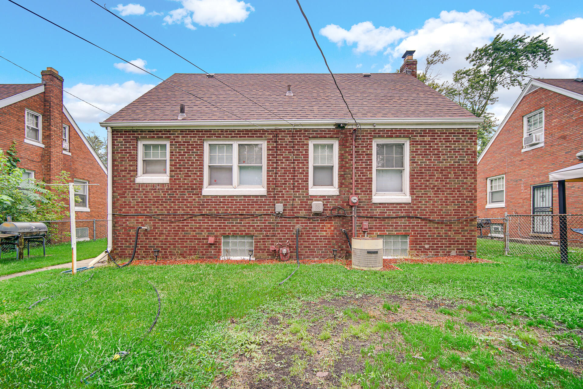 4641 Delaware Street Gary, IN 46409 - Photo 21 of 22 a front view of a house with a yard