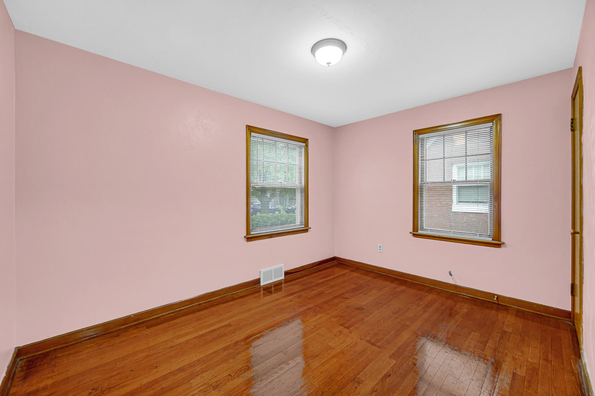 4641 Delaware Street Gary, IN 46409 - Photo 5 of 22 a view of an empty room with a window