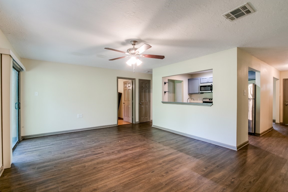 24615 Wilderness Road Spring, TX 77380 - Photo 13 of 34 wooden floor in an empty room with a window