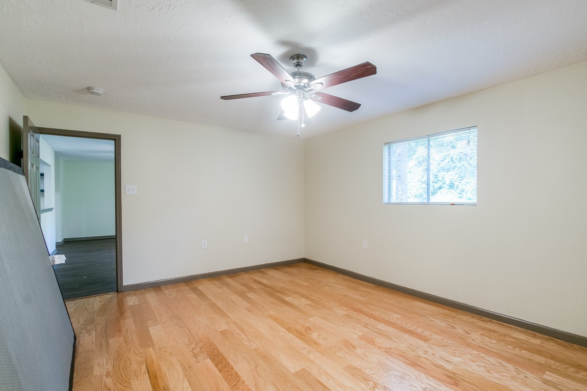 24615 Wilderness Road Spring, TX 77380 - Photo 30 of 34 a view of an empty room with a window