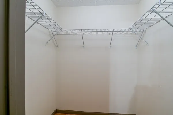 a view of a room with racks on the wall
