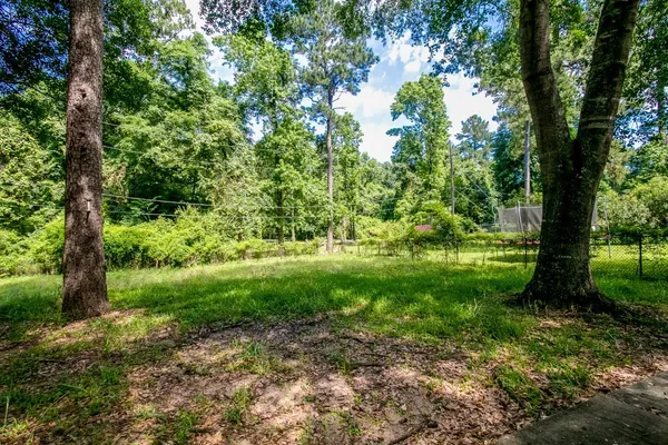 a view of outdoor space and a yard