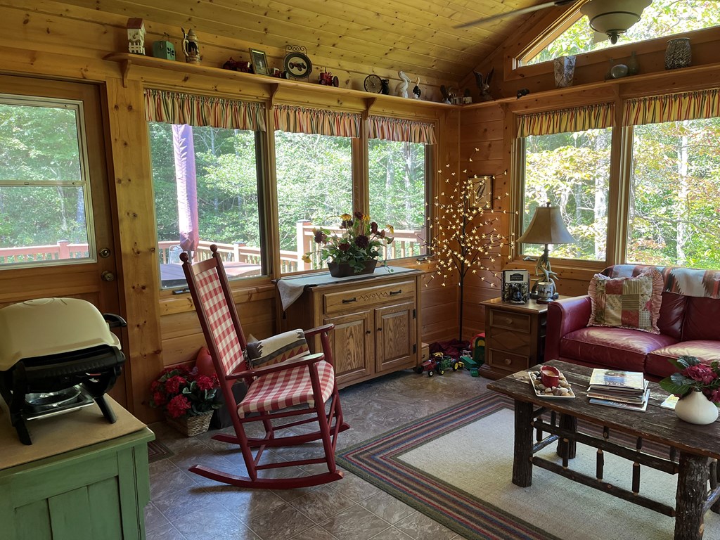 3021 Hanging Dog Road Murphy, NC 28906 - Photo 13 of 68 a living room with furniture and a window