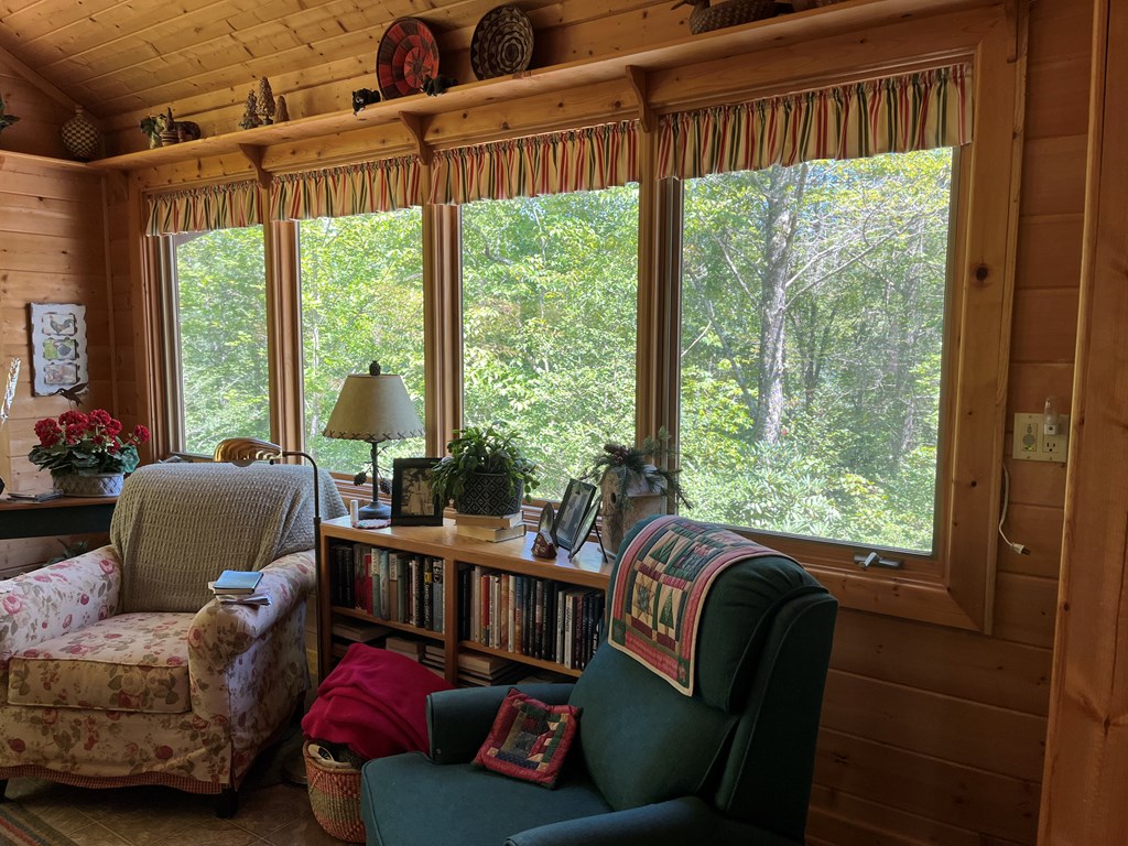 3021 Hanging Dog Road Murphy, NC 28906 - Photo 14 of 68 a living room with furniture and a large window