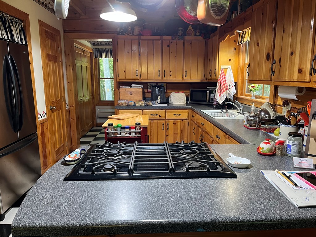 3021 Hanging Dog Road Murphy, NC 28906 - Photo 15 of 68 a kitchen with lots of counter space and a window