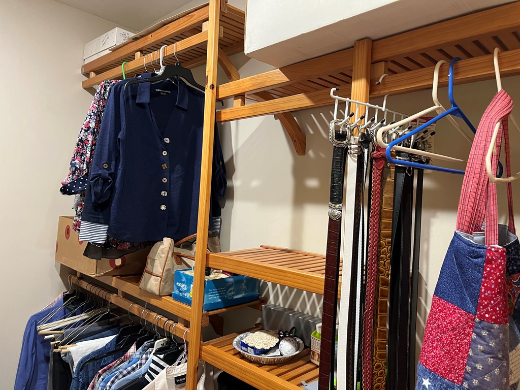 3021 Hanging Dog Road Murphy, NC 28906 - Photo 22 of 68 a view of walk in closet with clothes and shoes