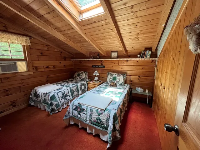 a bathroom with a sink a mirror and a toilet