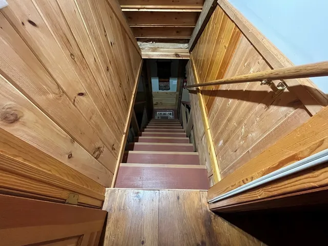a kitchen with a sink a stove and a refrigerator