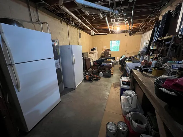 a view of a balcony with chairs and wooden floor