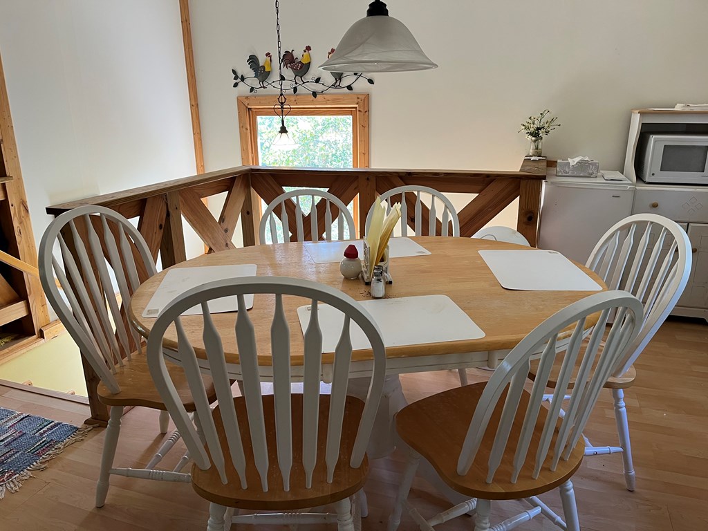 3021 Hanging Dog Road Murphy, NC 28906 - Photo 48 of 68 a view of a dining room with furniture window and wooden floor