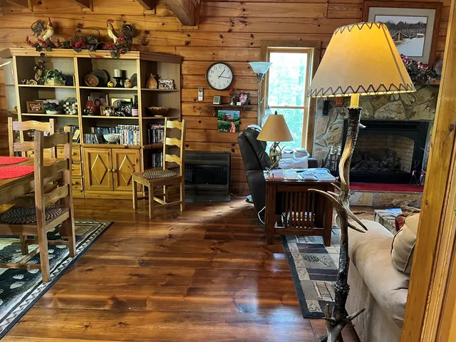 a view of a dining room with wooden shelves