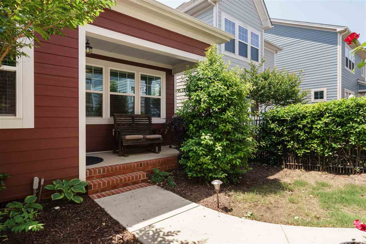 5622 Wade Park Boulevard Raleigh, NC 27607 - Photo 21 of 25 BACK YARD VIEW WITH COZY BACK PORCH. PERFECT FOR ENJOYING SOME RELAXING TIME OUTSIDE! BACK YARD
