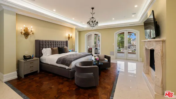 a bedroom with bed and window