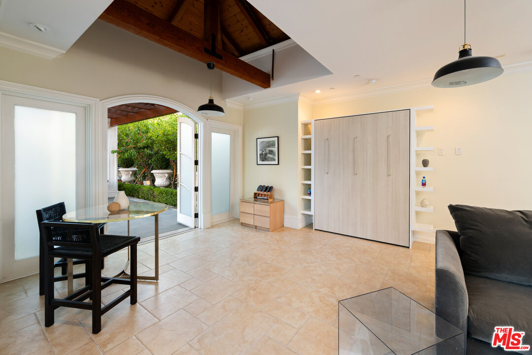 718 North Rodeo Drive Beverly Hills, CA 90210 - Photo 47 of 51 a living room with furniture