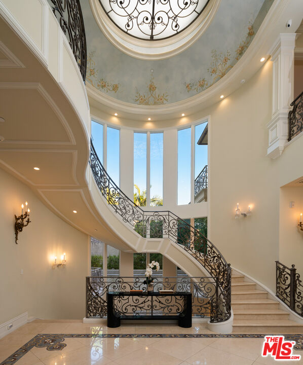 718 North Rodeo Drive Beverly Hills, CA 90210 - Photo 6 of 51 a view of entryway and hall with wooden floor