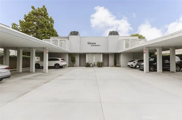 a view of a car parked in front of building