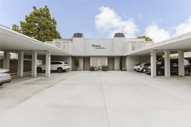 a view of a car parked in front of building