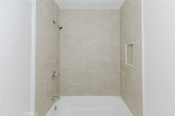 a bathroom with a bathtub
