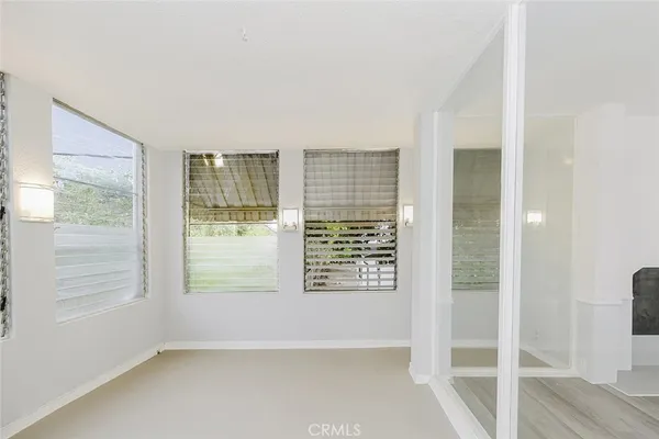 an empty room with windows