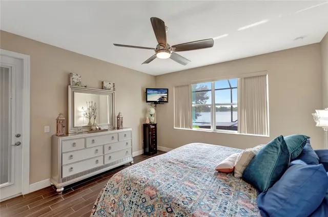 a bed room with a bed and a dresser