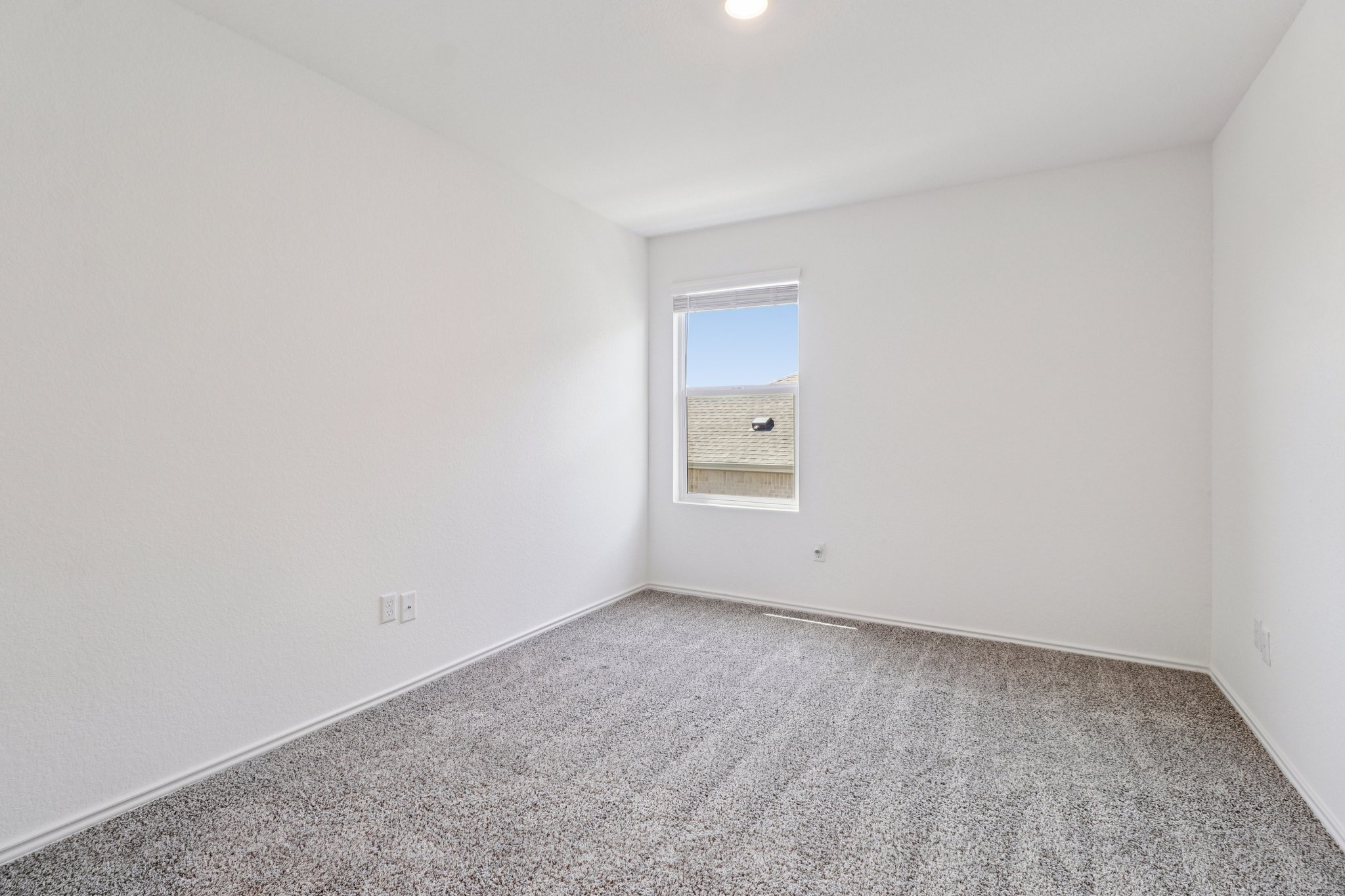 1201 Mallow Road Leander, TX 78641 - Photo 26 of 40 Empty room featuring light colored carpet and baseboards