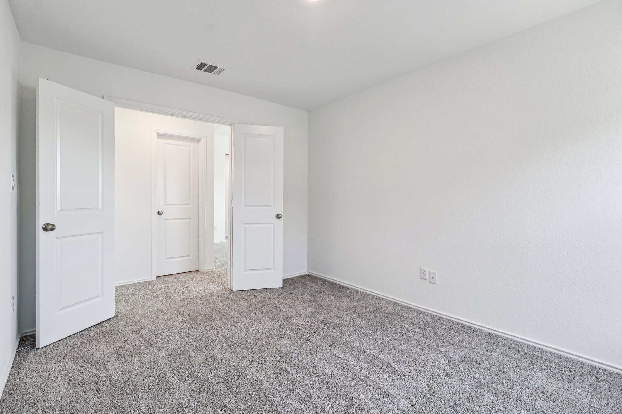 1201 Mallow Road Leander, TX 78641 - Photo 27 of 40 Unfurnished bedroom with carpet floors and baseboards
