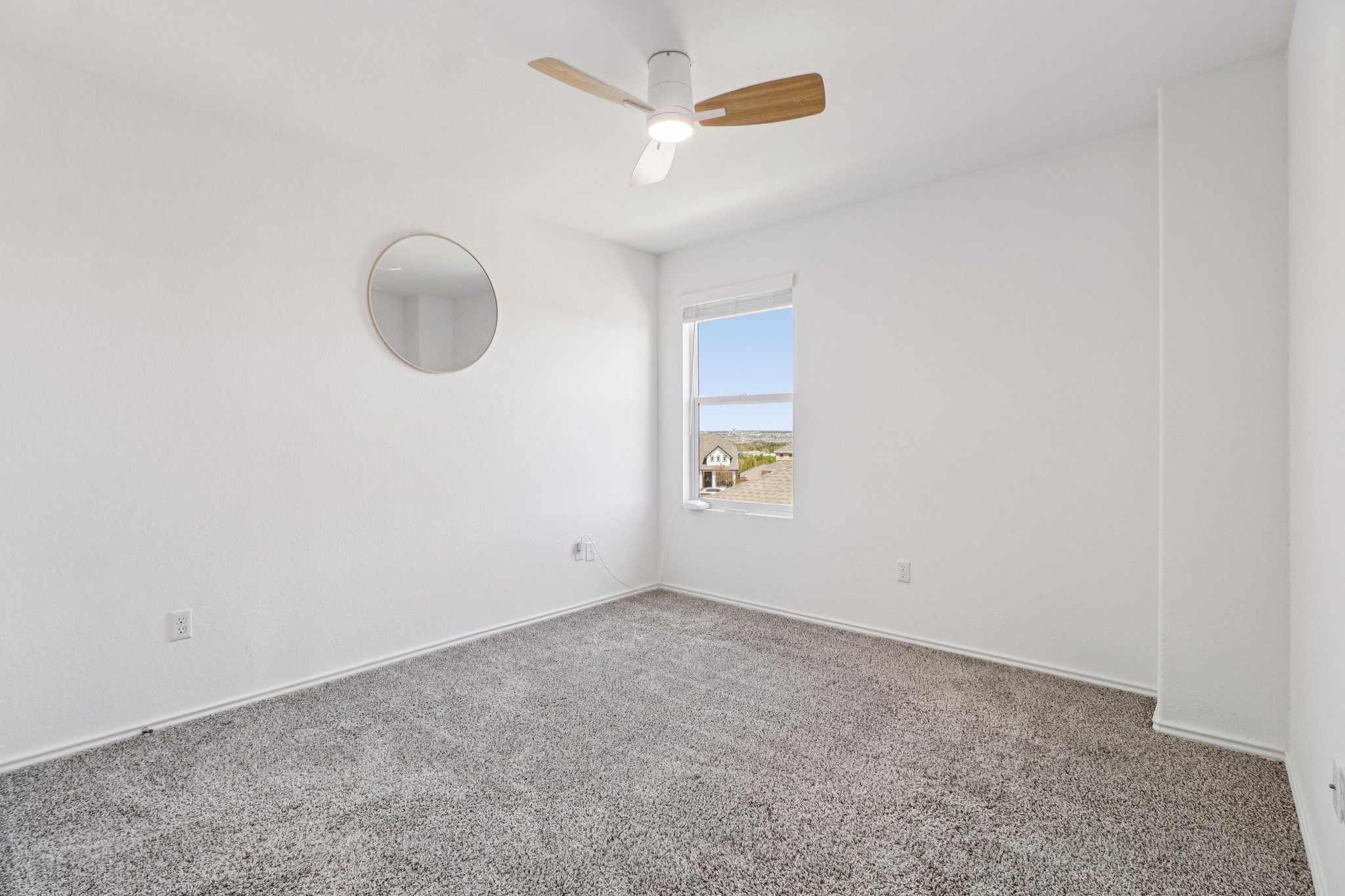 1201 Mallow Road Leander, TX 78641 - Photo 32 of 40 Unfurnished room featuring carpet floors and a ceiling fan