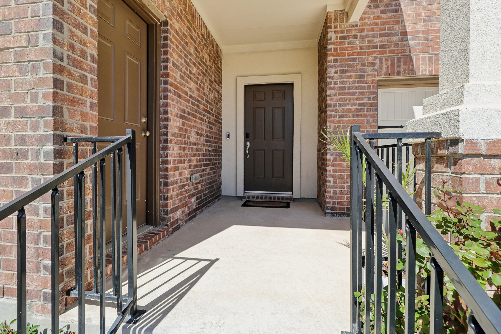 1201 Mallow Road Leander, TX 78641 - Photo 4 of 40 Doorway to property featuring brick siding