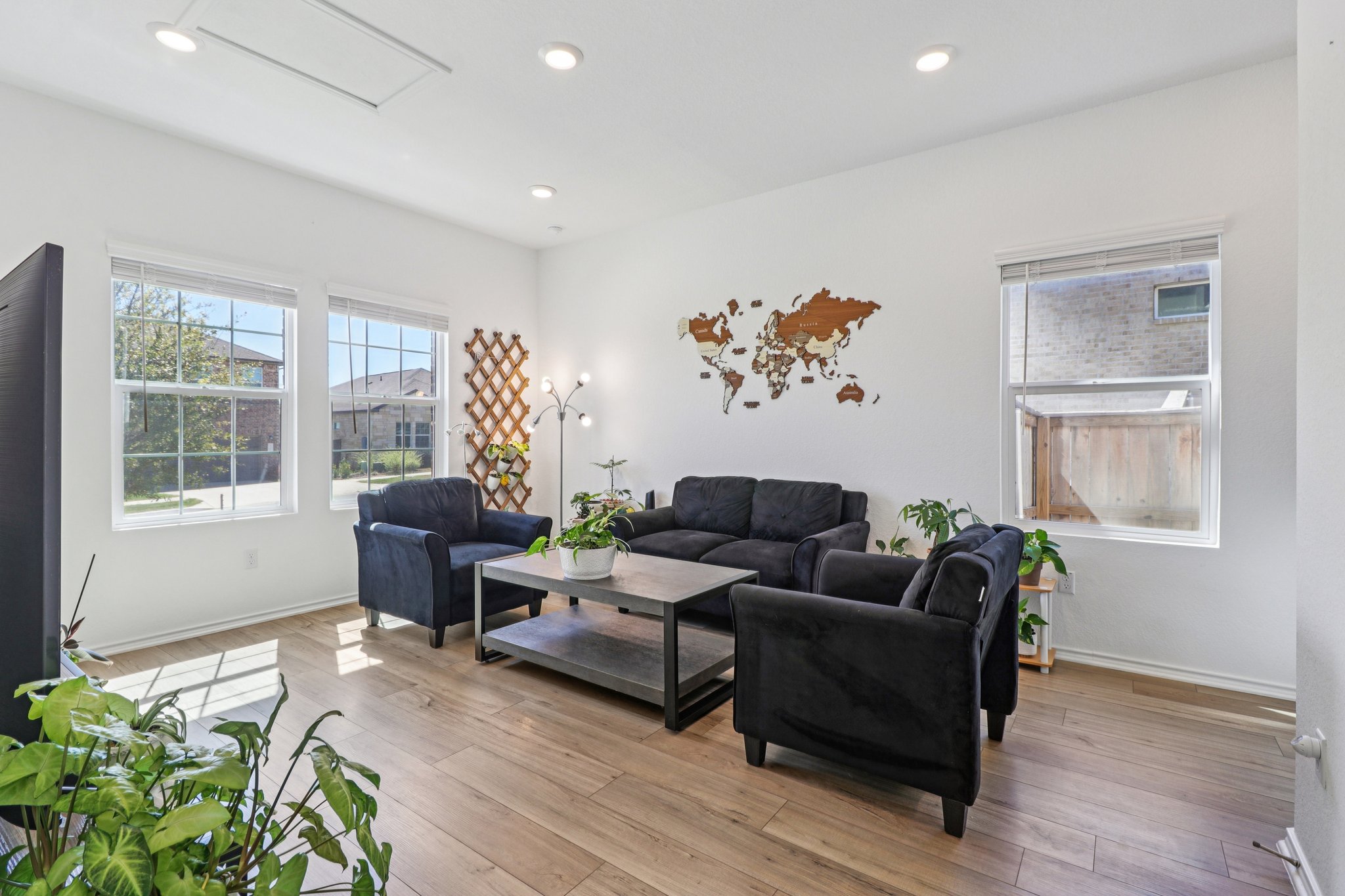 1201 Mallow Road Leander, TX 78641 - Photo 5 of 40 Living area with light wood finished floors and recessed lighting