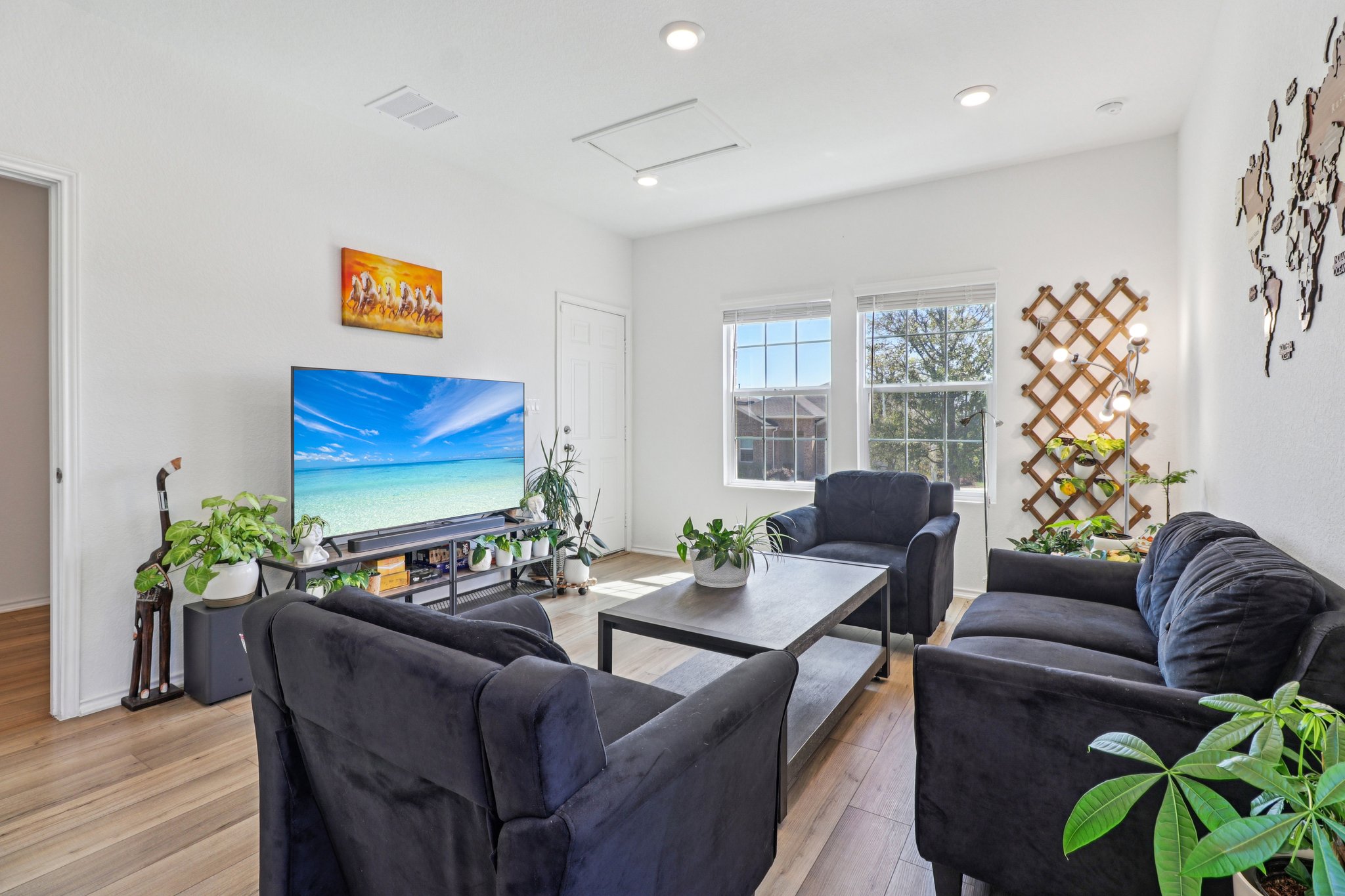 1201 Mallow Road Leander, TX 78641 - Photo 6 of 40 Living area with light wood-type flooring and recessed lighting