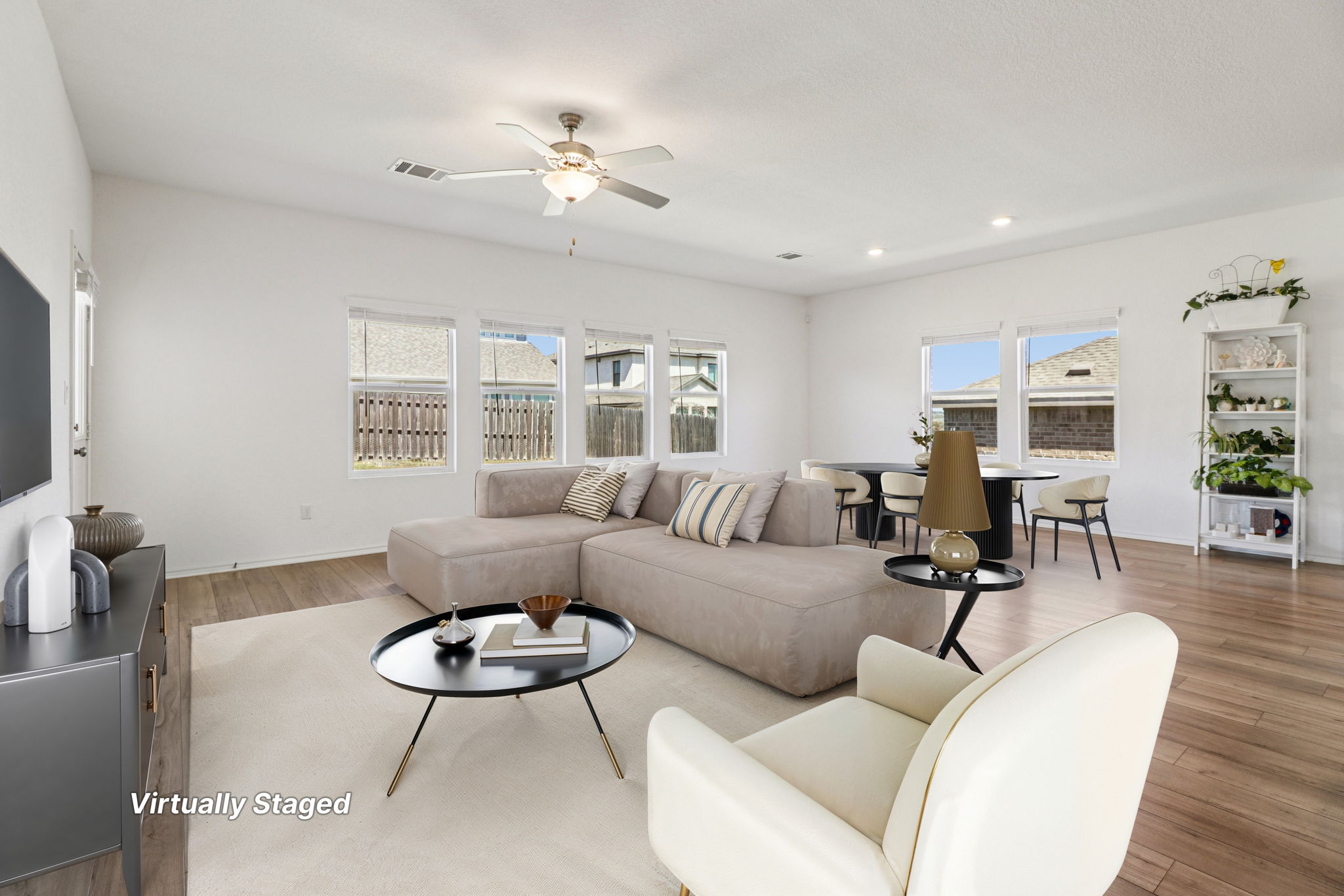 1201 Mallow Road Leander, TX 78641 - Photo 9 of 40 Living room with wood finished floors, ceiling fan, and recessed lighting