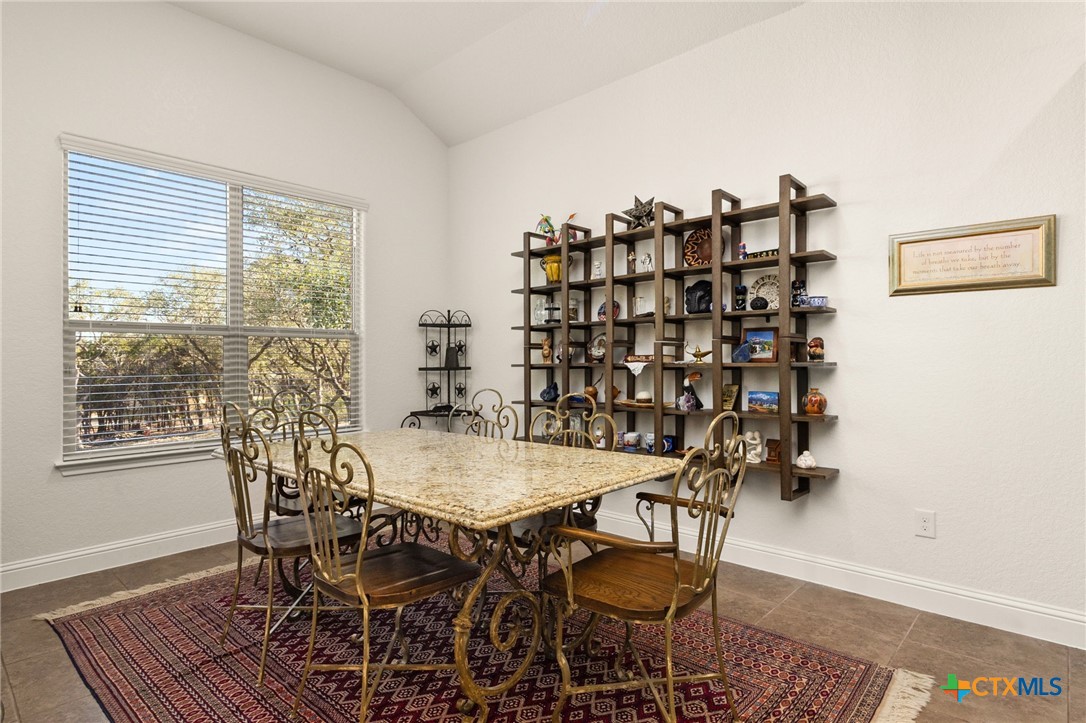 880 Haven Point Loop New Braunfels, TX 78132 - Photo 16 of 41 Dining Space - Open to Kitchen and Living