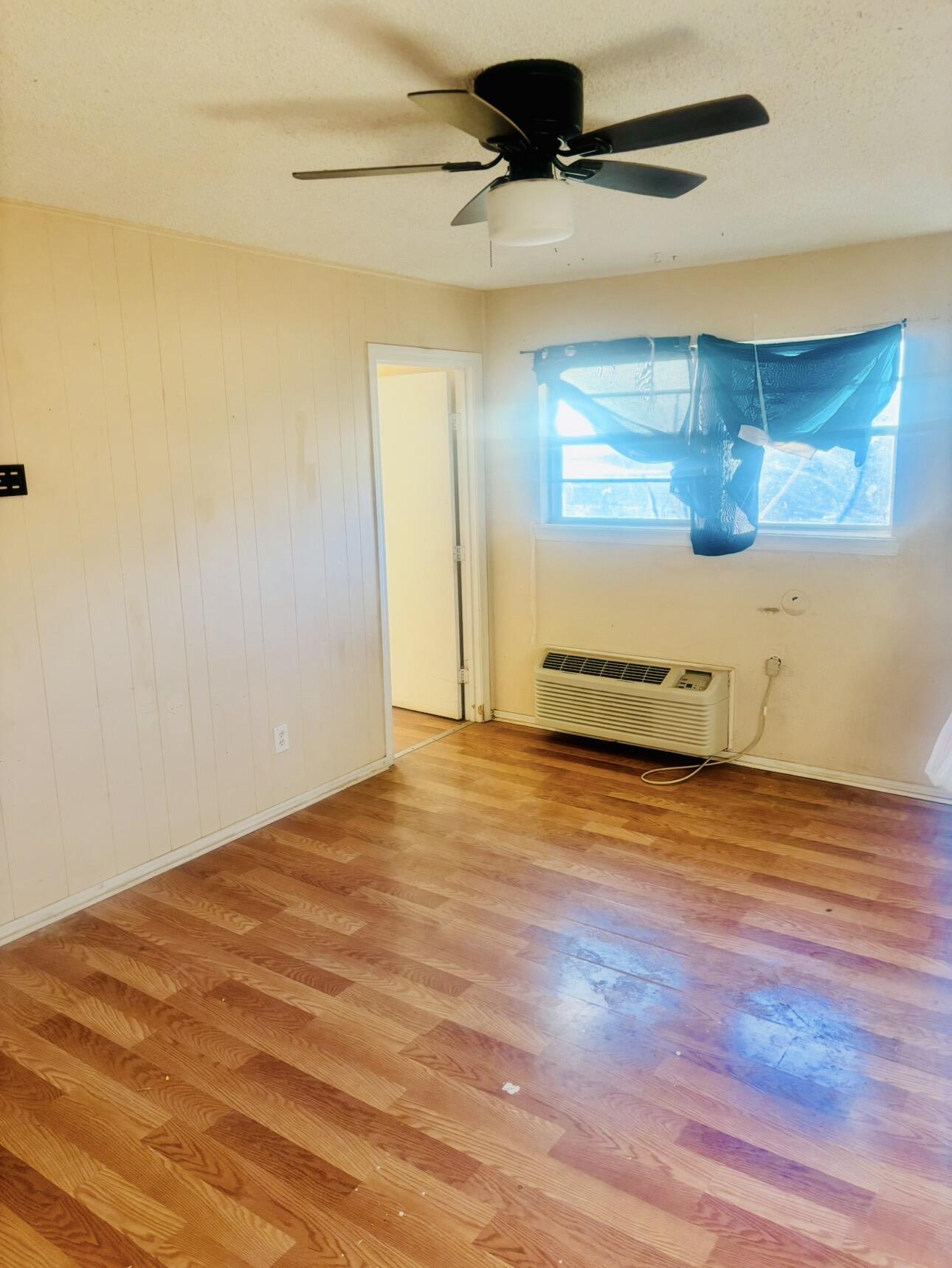 1608 59th Street Lubbock, TX 79412 - Photo 6 of 9 a view of an empty room