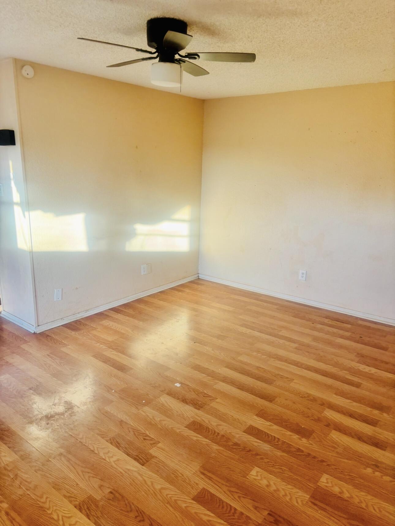 1608 59th Street Lubbock, TX 79412 - Photo 7 of 9 an empty room with a window